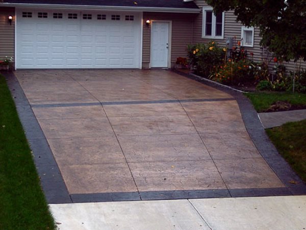 Decorative stamped concrete driveway with border